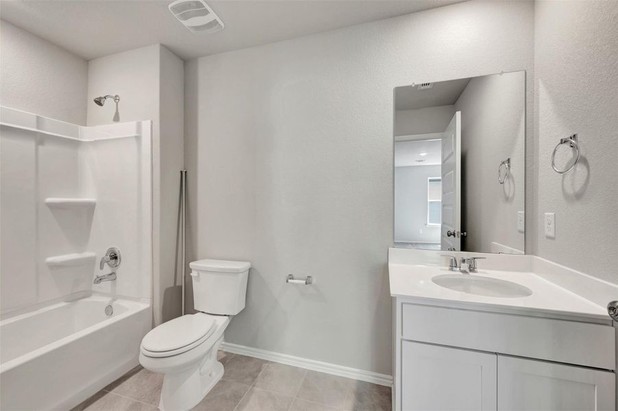 Furnished interior view inside a new home in Carillon, Manor (Image 11).