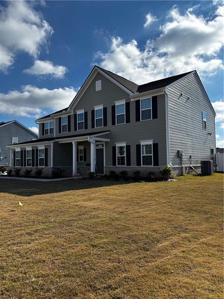 Exterior details and patio area of a home in , Locust Grove (Image 3). Exterior details and patio area of a home in , Locust Grove (Image 3).