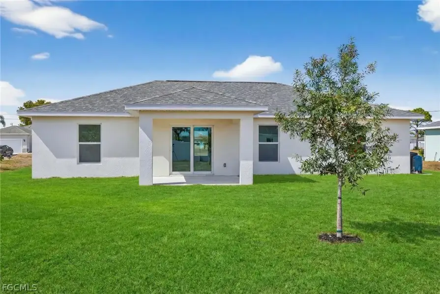 Exterior details and patio area of a home in Cape Coral, Cape Coral (Image 3).
