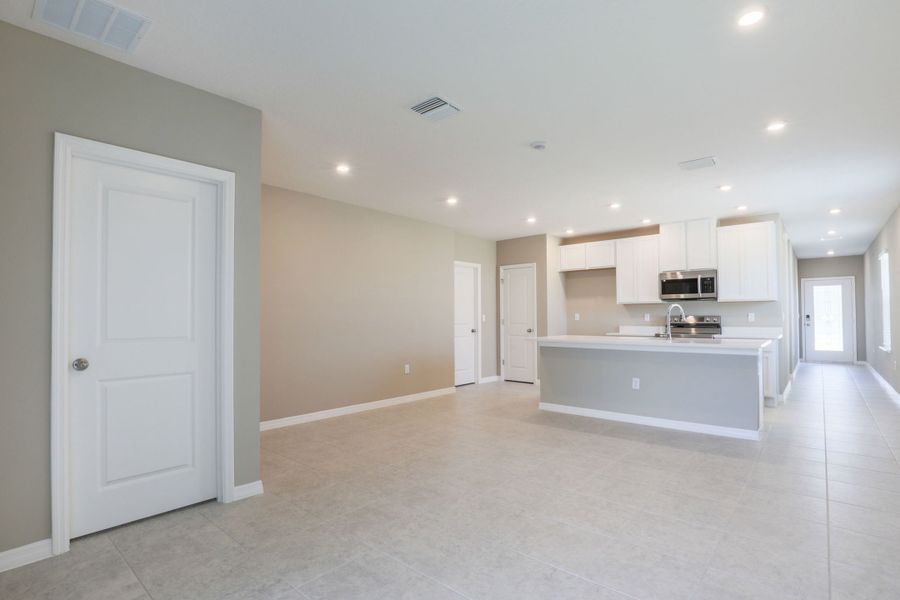 Representative unfurnished interior of a home built from the Vista by Maronda Homes in Malabar Springs, Palm Bay (Image 6). Representative unfurnished interior of a home built from the Vista by Maronda Homes in Malabar Springs, Palm Bay (Image 6).