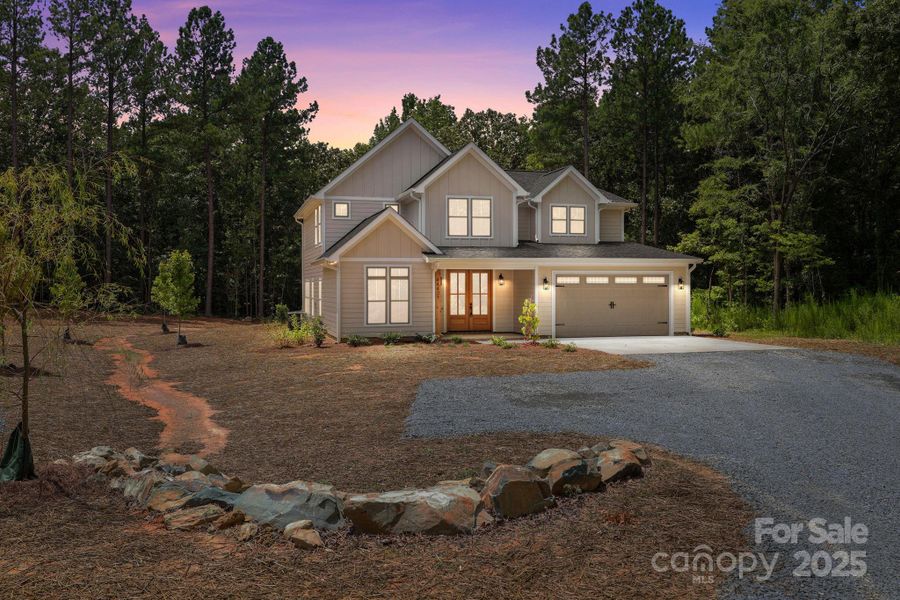 Front exterior of a new home in , Richfield, NC, highlighting curb appeal (Image 25).