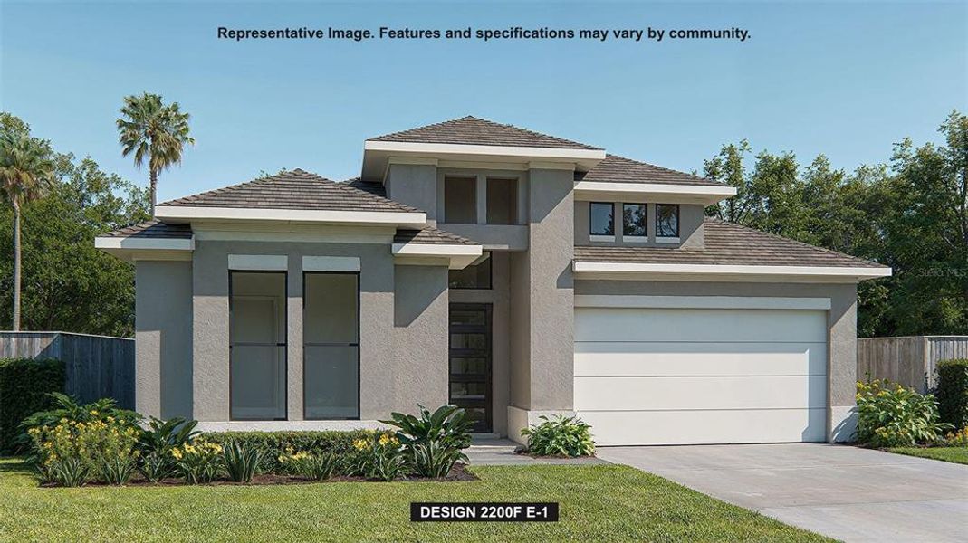 Front exterior of a new home in Sanctuary at Seaire, Parrish, FL, highlighting curb appeal (Image 1). Front exterior of a new home in Sanctuary at Seaire, Parrish, FL, highlighting curb appeal (Image 1).