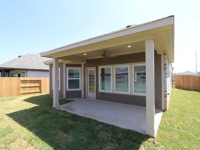 Front exterior of a new home in Miller's Pond, Rosenberg, TX, highlighting curb appeal (Image 1). Front exterior of a new home in Miller's Pond, Rosenberg, TX, highlighting curb appeal (Image 1).