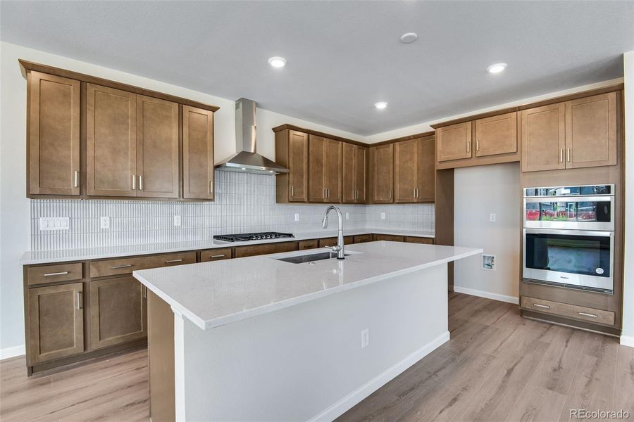 Furnished interior view inside a new home in Ensemble at The Aurora Highlands, Aurora (Image 16).