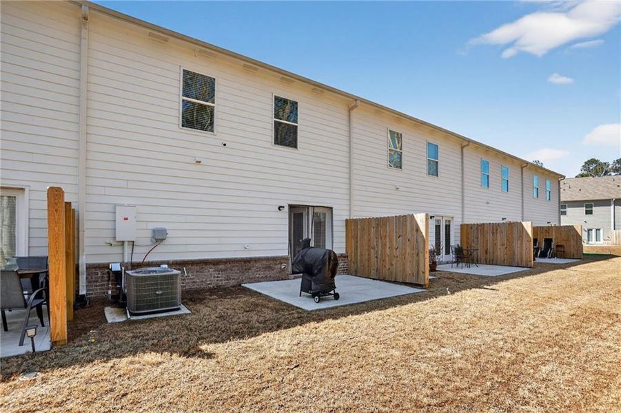 Exterior details and patio area of a home in , Buford (Image 3).