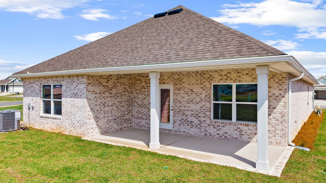Exterior details and patio area of a home in Owl's Head Farms, Freeport (Image 18).