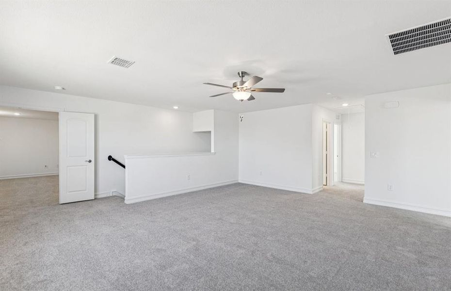 Spacious game room on second level Spacious game room on second level