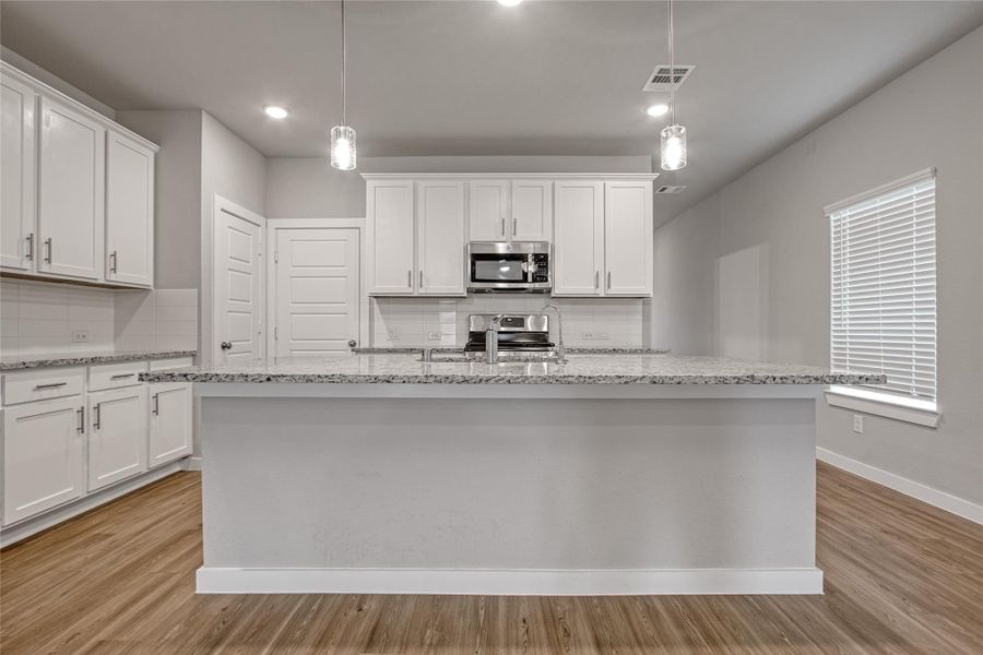 Look at all the storage! The front door and half bath are down the hall to the right. The garage is to the left with the pantry beside. Look at all the storage! The front door and half bath are down the hall to the right. The garage is to the left with the pantry beside.