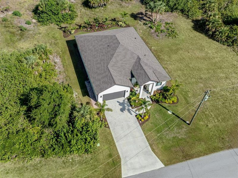 Front exterior of a new home in , Rotonda West, FL, highlighting curb appeal (Image 21).