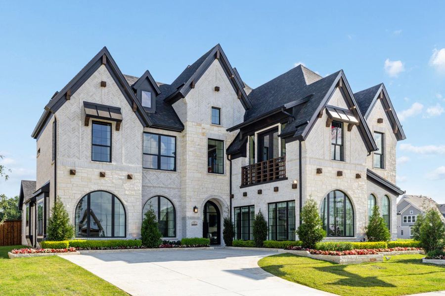 Representative exterior photo of a completed home built from the Grand Riverside by Grand Homes in Monterra, Fate, TX (Image 21).