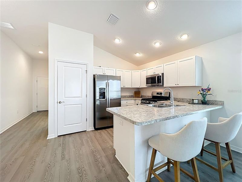 Furnished interior view inside a new home in , The Villages (Image 39).