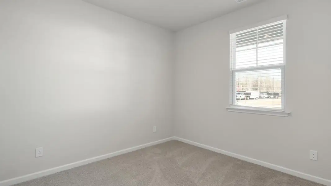 Spacious, unfurnished interior of a new home in The Grove at Blake Farm, Wilmington (Image 15).