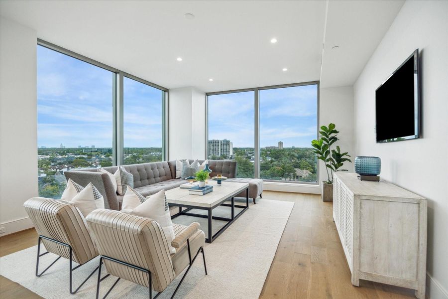 Floor-to-ceiling windows showcase panoramic Northern views of the city. Floor-to-ceiling windows showcase panoramic Northern views of the city.