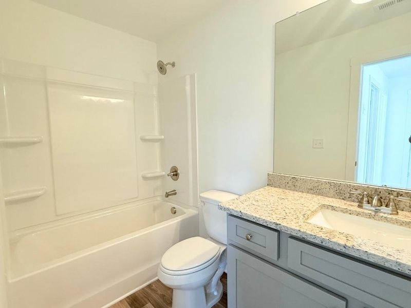 Furnished interior view inside a new home in Westlyn, Winder (Image 7).