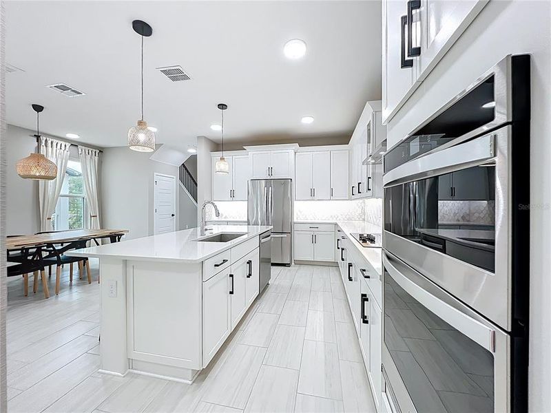 Furnished interior view inside a new home in , Winter Garden (Image 6).