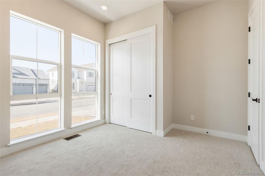 Spacious, unfurnished interior of a new home in Kitchel Lake at Serratoga Falls, Timnath (Image 25).