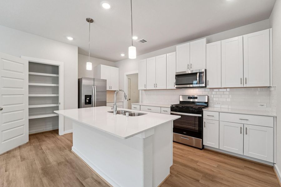 Furnished interior view inside a new home in Landing Meadows - Traditional Series, New Caney (Image 11). Furnished interior view inside a new home in Landing Meadows - Traditional Series, New Caney (Image 11).