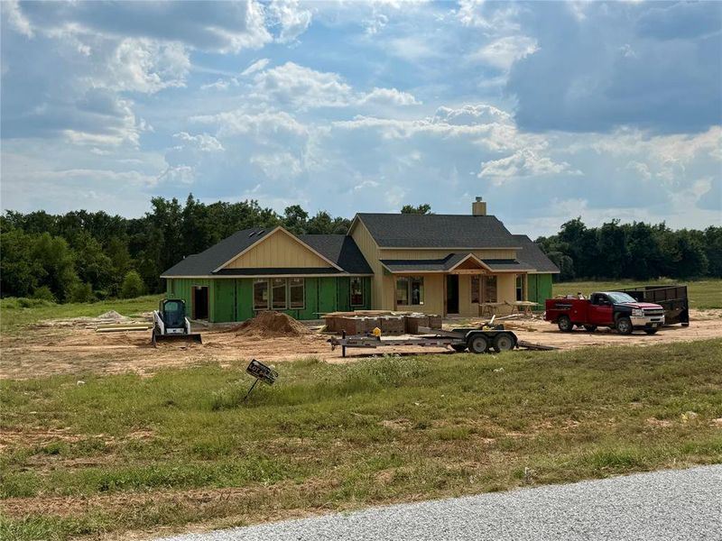 View of front of home with a chimney