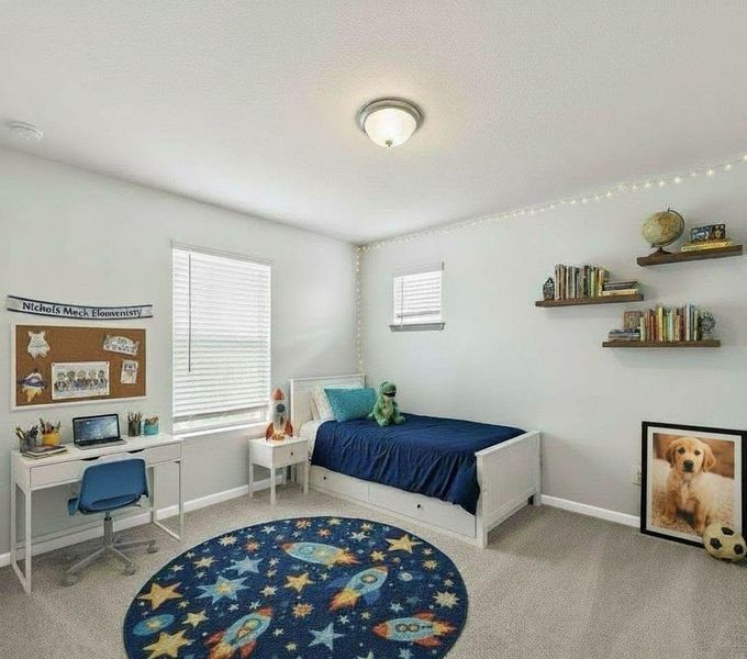 Furnished interior view inside a new home in Creekhaven, Iowa Colony (Image 20).