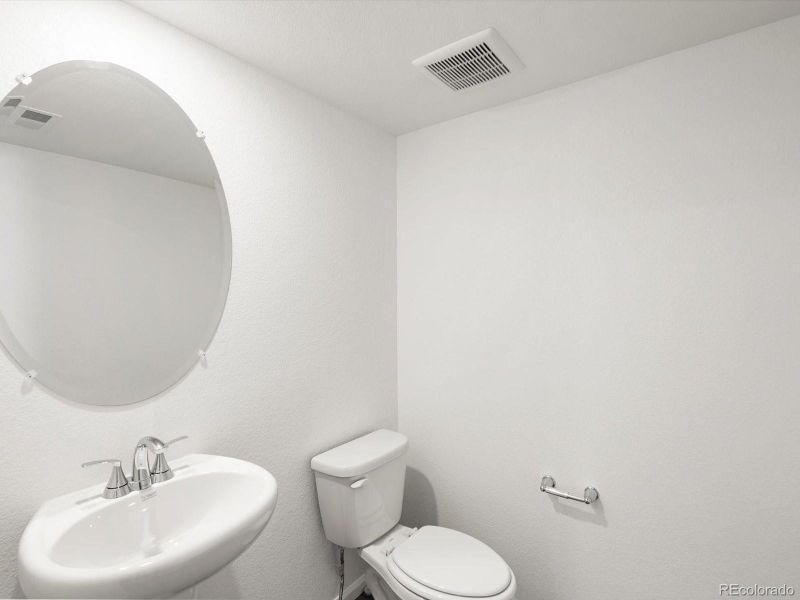 Furnished interior view inside a new home in Skyview at High Point, Aurora (Image 10).