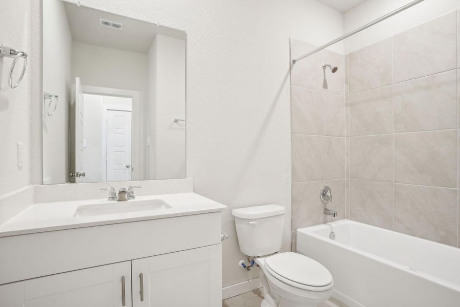 Furnished interior view inside a new home in Montgomery Oaks - Premier, Conroe (Image 5). Furnished interior view inside a new home in Montgomery Oaks - Premier, Conroe (Image 5).