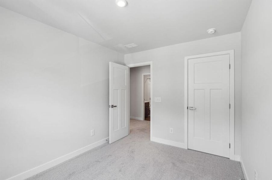 Spacious, unfurnished interior of a new home in Crescent Cove, Summerville (Image 17). Spacious, unfurnished interior of a new home in Crescent Cove, Summerville (Image 17).