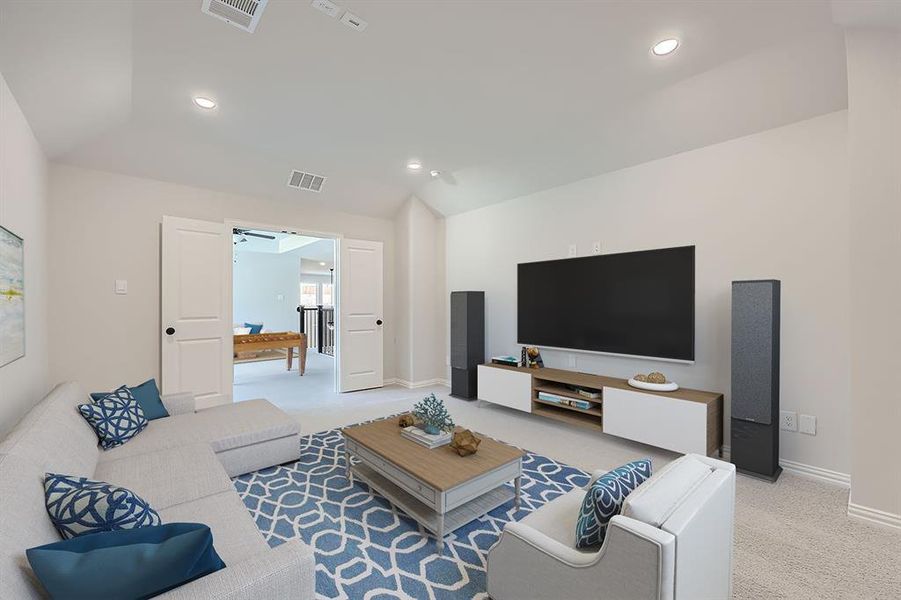 VIRTUALLY STAGED PHOTO - Living room featuring light carpet, vaulted ceiling, and ceiling fan