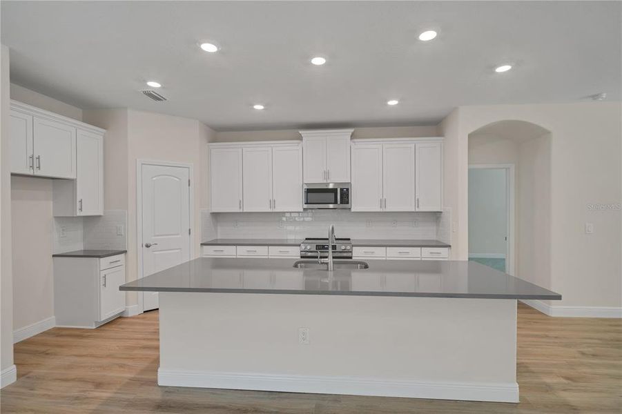 Furnished interior view inside a new home in Rose Haven, New Port Richey (Image 12).