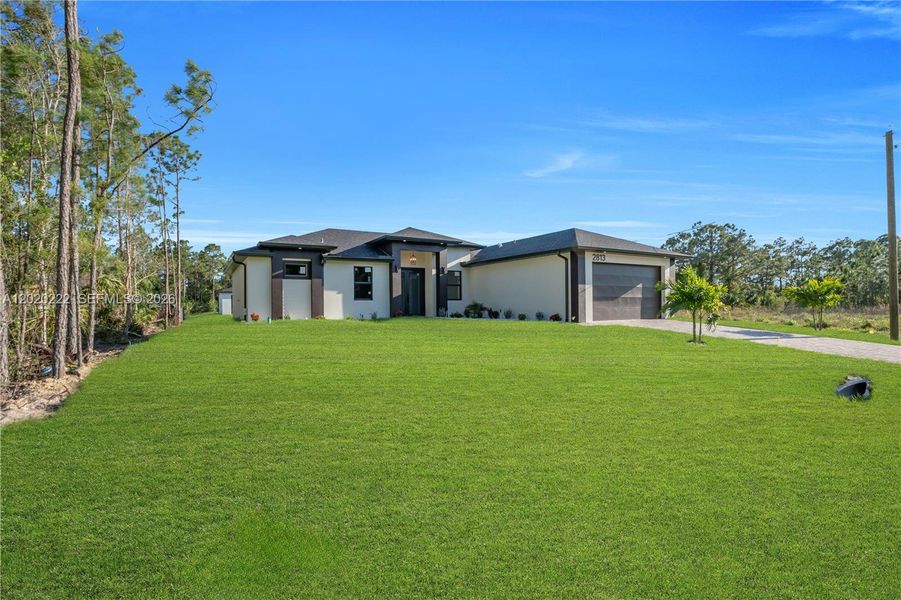 Exterior details and patio area of a home in , Lehigh Acres (Image 32).