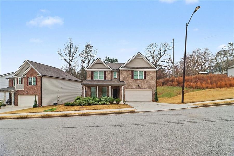 Front exterior of a new home in , Atlanta, GA, highlighting curb appeal (Image 7).