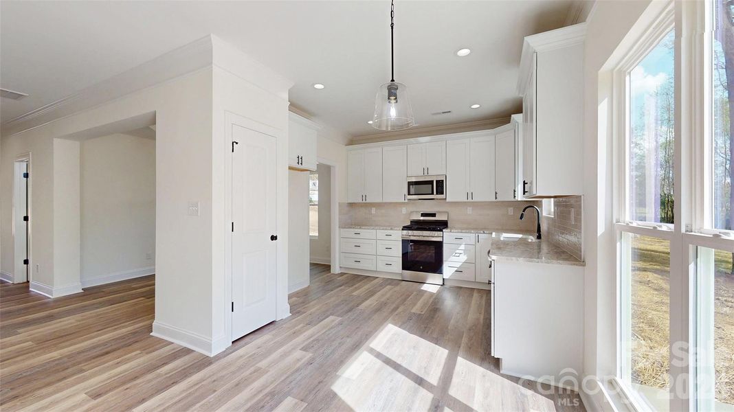 Furnished interior view inside a new home in , Monroe (Image 10). Furnished interior view inside a new home in , Monroe (Image 10).