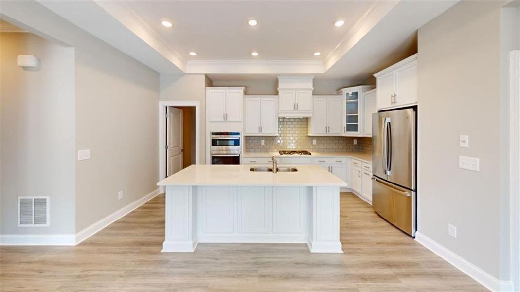 Furnished interior view inside a new home in The Courtyards at Redbud Lane, Holly Springs (Image 6).