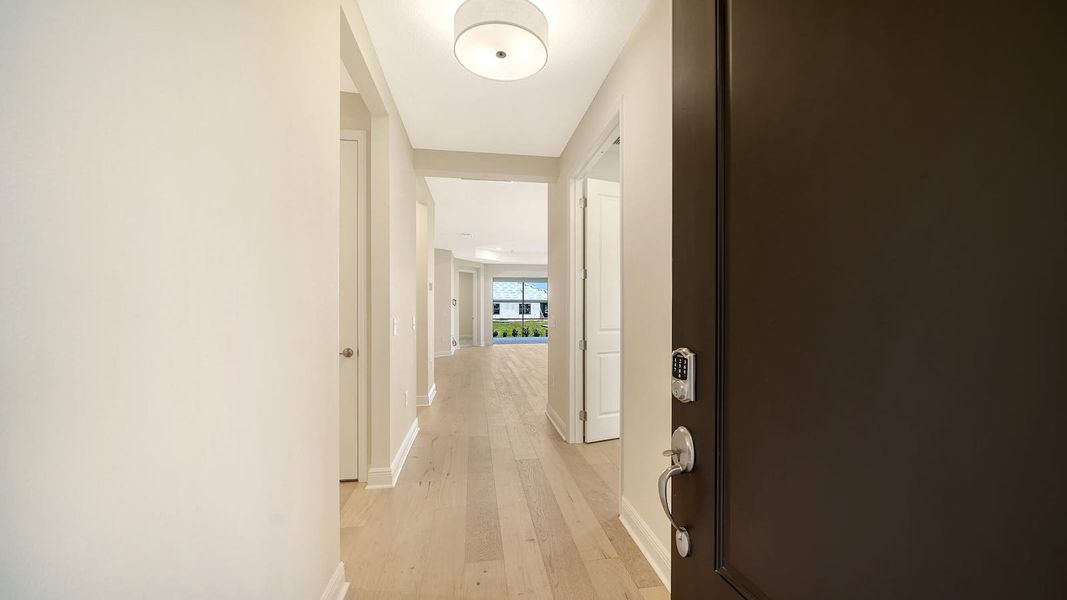 Spacious, unfurnished interior of a new home in Vistera of Venice Real Estate and Homes for Sale in Venice, FL - Neal Communities, Nokomis (Image 34).