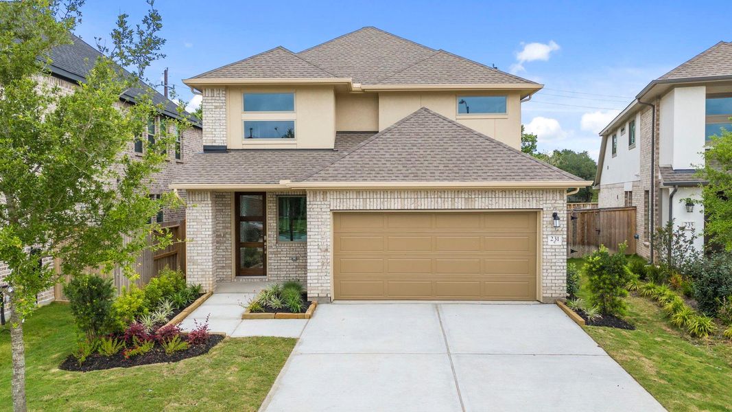 Front exterior of a new home in Candela, Richmond, TX, highlighting curb appeal (Image 2). Front exterior of a new home in Candela, Richmond, TX, highlighting curb appeal (Image 2).