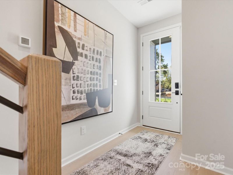 Front Foyer Through 8' Doorway. *Model Photos | Actual Finishes, Structural Selections, and Orientation May Vary. Front Foyer Through 8' Doorway. *Model Photos | Actual Finishes, Structural Selections, and Orientation May Vary.