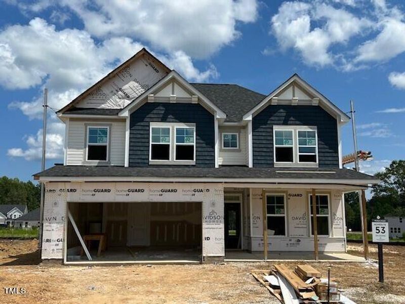 Front exterior of a new home in Wellers Knoll, Lillington, NC, highlighting curb appeal (Image 39).