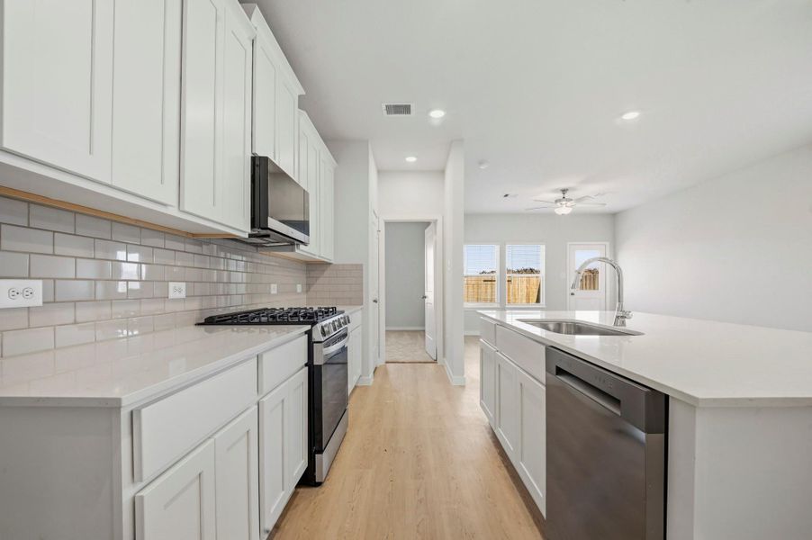 Furnished interior view inside a new home in Barrett Crossing, Crosby (Image 6).