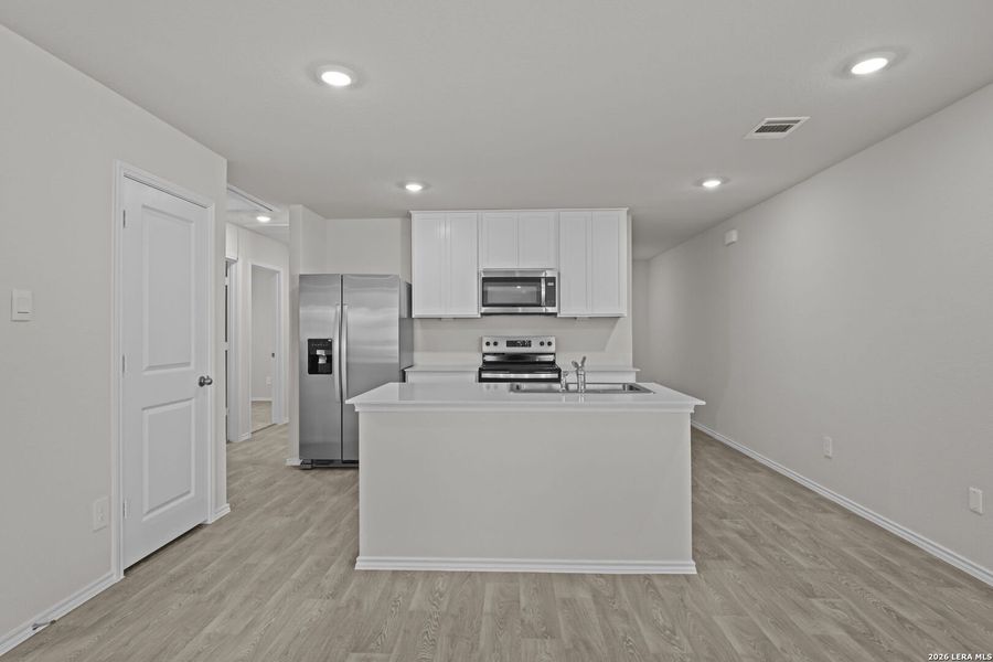 Furnished interior view inside a new home in Swenson Heights, Seguin (Image 9).