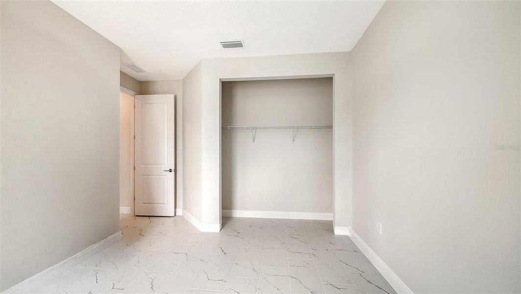 Spacious, unfurnished interior of a new home in Grand Park, Sarasota (Image 34). Spacious, unfurnished interior of a new home in Grand Park, Sarasota (Image 34).
