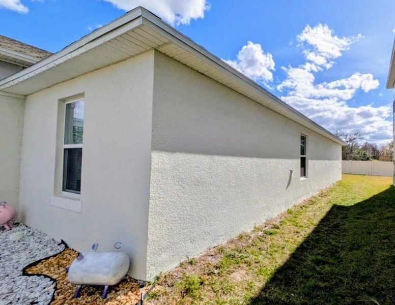 Exterior details and patio area of a home in Hammock Reserve, Haines City (Image 2). Exterior details and patio area of a home in Hammock Reserve, Haines City (Image 2).