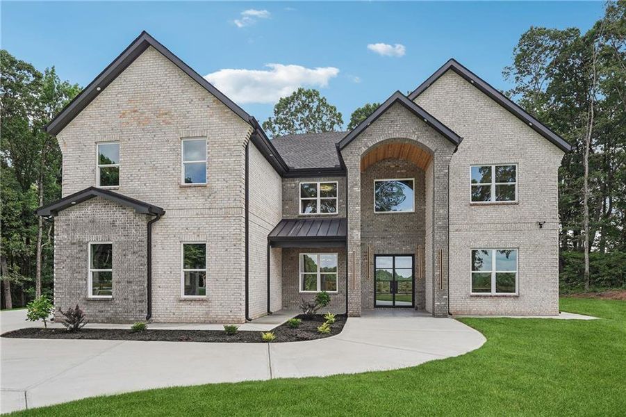 Front exterior of a new home in , Commerce, GA, highlighting curb appeal (Image 33).