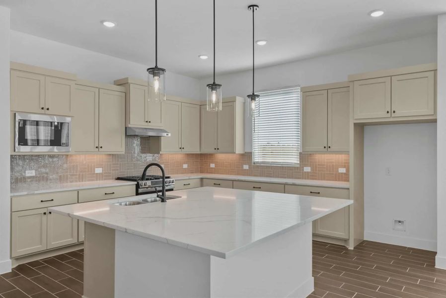 Representative furnished interior of a home built from the Nicklaus by Chesmar Homes in Riceland Alley Loads, Mont Belvieu (Image 5).