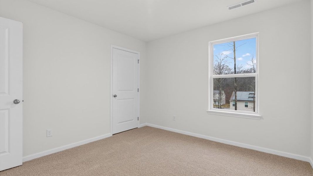 Spacious, unfurnished interior of a new home in Mangum Farms, Stem (Image 17).