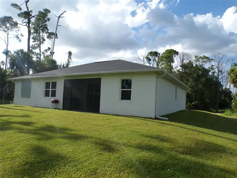 Exterior details and patio area of a home in , North Port (Image 4).