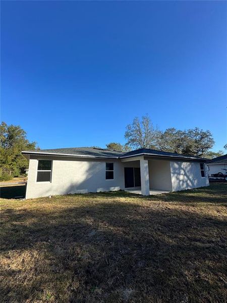 Exterior details and patio area of a home in , Citrus Springs (Image 25).