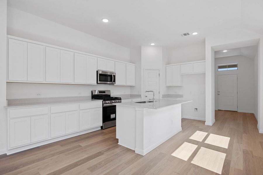 Furnished interior view inside a new home in Trinity Ranch, Elgin (Image 7).