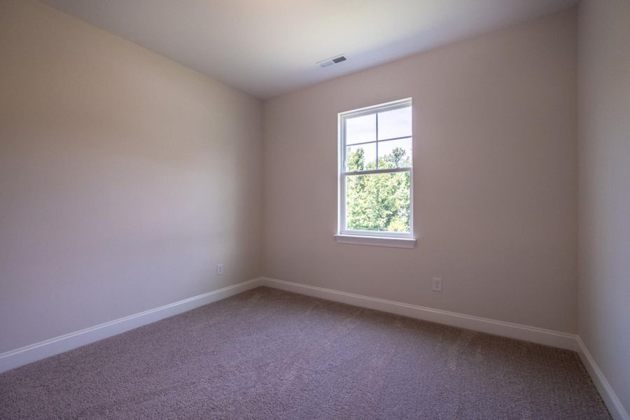 Spacious, unfurnished interior of a new home in Cottages at Piper Village, Trinity (Image 24). Spacious, unfurnished interior of a new home in Cottages at Piper Village, Trinity (Image 24).
