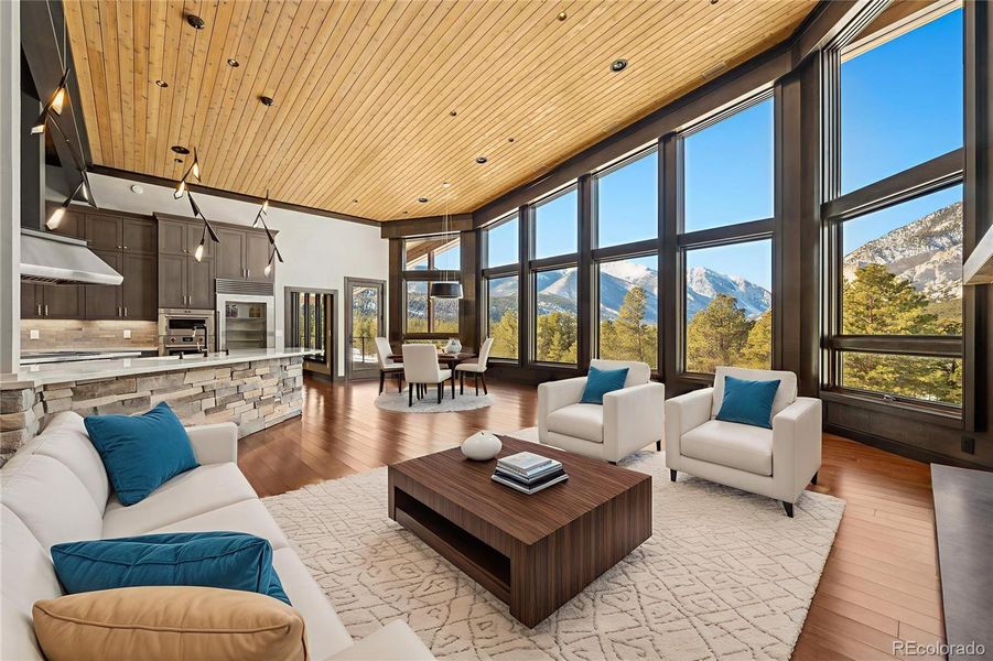 Expansive great room flowing into dining and gourmet kitchen Expansive great room flowing into dining and gourmet kitchen