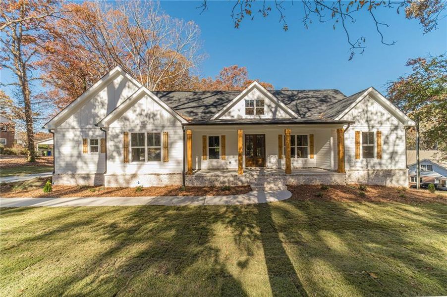 Front exterior of a new home in , Monroe, GA, highlighting curb appeal (Image 26).