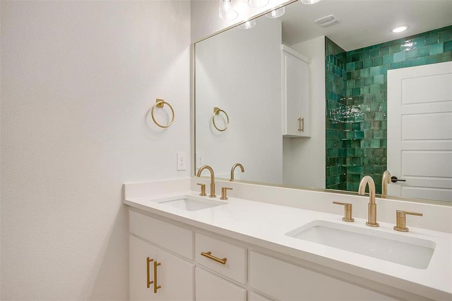 Bathroom featuring dual vanity